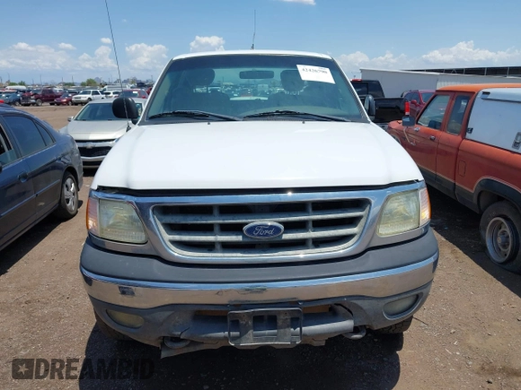 2002 Ford F-150 XL with VIN 2FTRX18W02CA22920, listed as a IAAI auction lot 42426790 with 153,433 mi miles and . Bid and sale history available at DreamBid. Image 6.