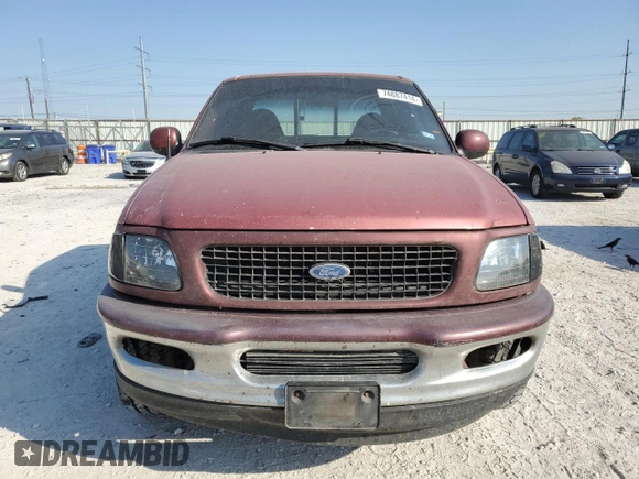 1997 Ford F-150 XL with VIN 1FTDX0721VKC14947, listed as a Copart auction lot 74887414 with 157,811 mi miles and Salvage title. Bid and sale history available at DreamBid. Image 5.