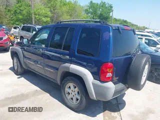 2004 Jeep Liberty Sport with VIN 1J4GK48KX4W241129, listed as a IAAI auction lot 41980258 with 259,048 mi miles and . Bid and sale history available at DreamBid. Image 3.