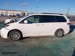 2013 Toyota Sienna XLE AAS with VIN 5TDYK3DC4DS305068, listed as a IAAI auction lot 40909667 with 227,746 mi miles. Bid and sale history available at carsss.com. Image 14.