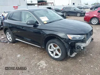 2021 Audi Q5 Premium with VIN WA1AAAFYXM2004808, listed as a IAAI auction lot 42451719 with 123,537 mi miles and . Bid and sale history available at DreamBid. Image 1.