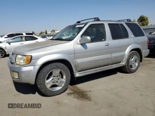 2002 Infiniti QX4 Luxury z VIN JNRDR09Y02W253447, wystawiony jako Copart lot #73896264 z przebiegiem 199 454 mil mil oraz Czysty tytuł • Clean title. Historia ofert i sprzedaży dostępna na DreamBid. Obrazek 1.