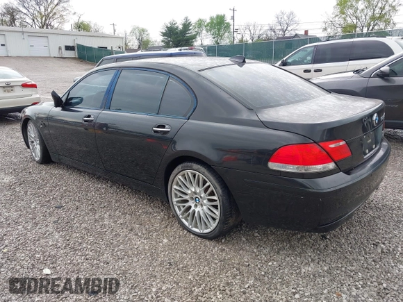 2007 BMW 7 Series 750Li with VIN WBAHN83577DT77290, listed as a IAAI auction lot 41908957 with 164,215 mi miles. Bid and sale history available at carsss.com. Image 3.
