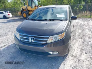 2012 Honda Odyssey Touring с VIN 5FNRL5H93CB133288, выставлен на аукционе IAAI как лот 42020622 с пробегом 184 077 миль миль и . История ставок и продаж доступна на DreamBid. Изображение 6.