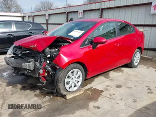 2013 Kia Rio LX with VIN KNADM4A31D6310504, listed as a IAAI auction lot 41579952 with 55,757 mi miles and . Bid and sale history available at DreamBid. Image 2.