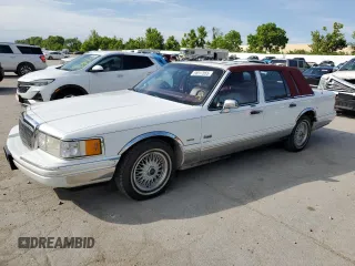 1993 Lincoln Town Car Executive z VIN 1LNLM81W7PY679503, wystawiony jako Copart lot #58517055 z przebiegiem 75 462 mil mil oraz Czysty tytuł • Clean title. Historia ofert i sprzedaży dostępna na DreamBid. Obrazek 1.