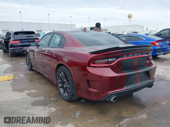 2020 Dodge Charger Scat Pack z VIN 2C3CDXGJ8LH132985, wystawiony jako IAAI lot #41316849 z przebiegiem 66 881 mil mil oraz . Historia ofert i sprzedaży dostępna na DreamBid. Obrazek 3.