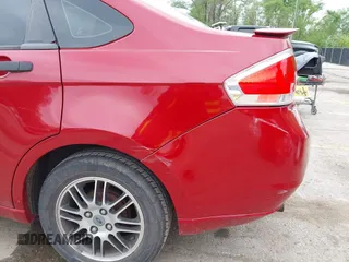 2010 Ford Focus SE with VIN 1FAHP3FN5AW160169, listed as a IAAI auction lot 42136904 with 146,605 mi miles. Bid and sale history available at carsss.com. Image 6.