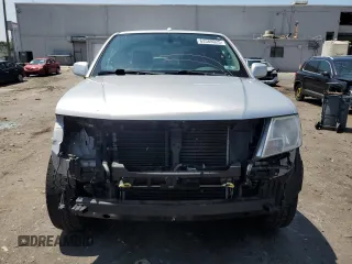 2010 Nissan Frontier Pro-4X with VIN 1N6AD0EV5AC435641, listed as a Copart auction lot 63388025 with 84,349 mi miles and Salvage title. Bid and sale history available at DreamBid. Image 5.