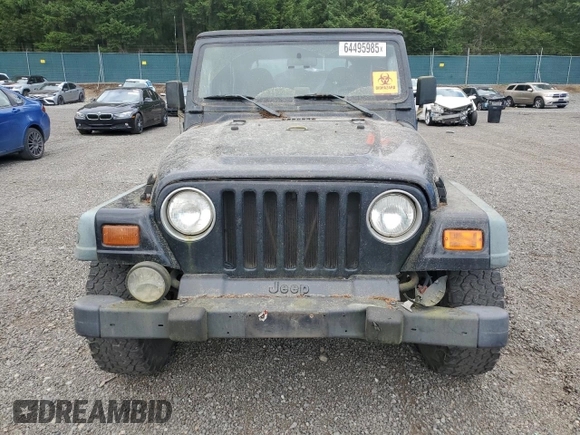 1998 Jeep Wrangler Sport z VIN 1J4FY19S7WP801709, wystawiony jako Copart lot #64495985 z przebiegiem 260 798 mil mil oraz Czysty tytuł • Clean title. Historia ofert i sprzedaży dostępna na DreamBid. Obrazek 5.
