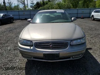 2002 Buick Regal LS z VIN 2G4WB55K421101234, wystawiony jako Copart lot #54744355 z przebiegiem Nie podano mil oraz Szkoda całkowita • Salvage title. Historia ofert i sprzedaży dostępna na DreamBid. Obrazek 5.