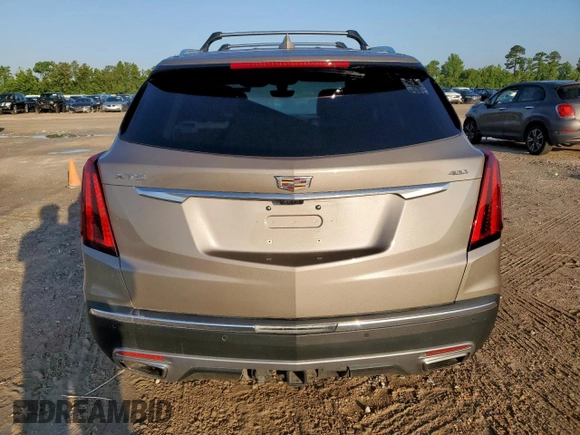 2022 Cadillac XT5 Premium Luxury FWD z VIN 1GYKNERS9NZ120517, wystawiony jako Copart lot #58978045 z przebiegiem 31 456 mil mil oraz Szkoda całkowita • Salvage title. Historia ofert i sprzedaży dostępna na DreamBid. Obrazek 6.