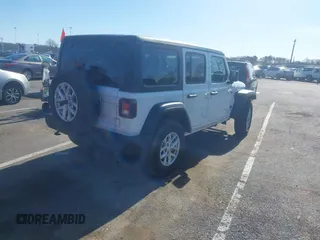 2023 Jeep Wrangler Sport S with VIN 1C4HJXDN4PW702277, listed as a IAAI auction lot 41835864 with 27,768 mi miles and . Bid and sale history available at DreamBid. Image 4.