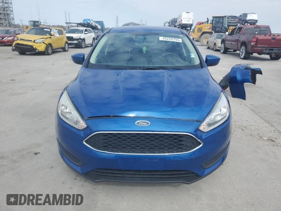 2018 Ford Focus SE z VIN 1FADP3F22JL328761, wystawiony jako Copart lot #45220705 z przebiegiem 71 639 mil mil oraz Szkoda całkowita • Salvage title. Historia ofert i sprzedaży dostępna na DreamBid. Obrazek 5.