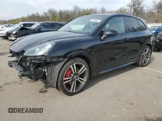 2013 Porsche Cayenne GTS with VIN WP1AD2A29DLA72323, listed as a Copart auction lot 52990885 with 100,812 mi miles and Salvage Title. Bid and sale history available at DreamBid. Image 1.