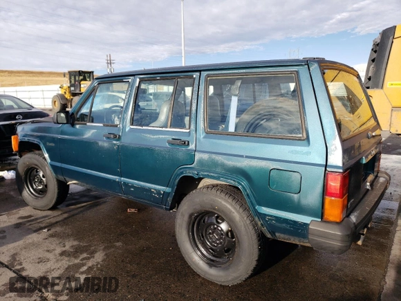 1996 Jeep Cherokee SE z VIN 1J4FJ28S6TL184205, wystawiony jako Copart lot #77558034 z przebiegiem 195 000 mil mil oraz Tytuł czysty. Historia ofert i sprzedaży dostępna na DreamBid. Obrazek 2.