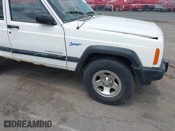 1998 Jeep Cherokee Sport z VIN 1J4FJ68SXWL243008, wystawiony jako IAAI lot #42411968 z przebiegiem 147 680 mil mil oraz . Historia ofert i sprzedaży dostępna na DreamBid. Obrazek 16.