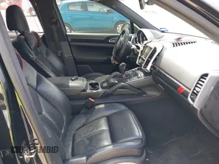 2014 Porsche Cayenne GTS with VIN WP1AD2A25ELA71350, listed as a IAAI auction lot 42031766 with 104,184 mi miles and . Bid and sale history available at DreamBid. Image 5.