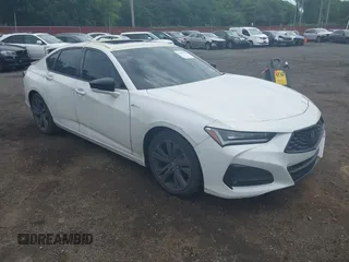 2023 Acura TLX w/A-Spec Package with VIN 19UUB6F50PA002399, listed as a IAAI auction lot 42671376 with 23,437 mi miles and . Bid and sale history available at DreamBid. Image 1.