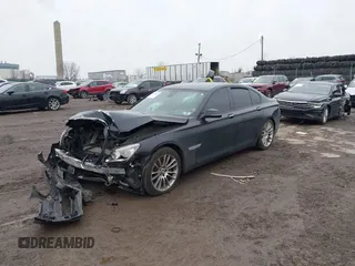 2015 BMW 7 Series 750i xDrive with VIN WBAYB6C59FD965820, listed as a IAAI auction lot 41558215 with 142,617 mi miles. Bid and sale history available at carsss.com. Image 16.