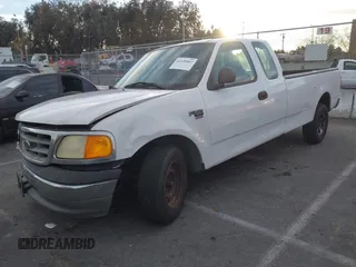 2004 Ford F-150 XL with VIN 2FTRX17W84CA43289, listed as a IAAI auction lot 41248462 with Not provided miles and . Bid and sale history available at DreamBid. Image 2.