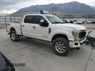 2017 Ford F-250 Lariat with VIN 1FT7W2BT6HED83358, listed as a Copart auction lot 55566865 with 140,578 mi miles and Salvage title. Bid and sale history available at DreamBid. Image 4.