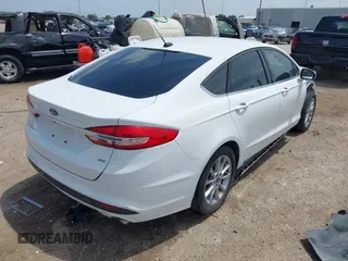 2017 Ford Fusion SE with VIN 3FA6P0H75HR370403, listed as a IAAI auction lot 42072154 with 113,941 mi miles. Bid and sale history available at carsss.com. Image 4.