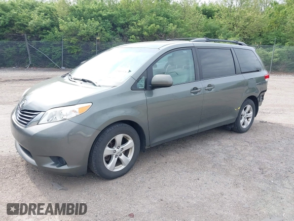 2014 Toyota Sienna LE AAS with VIN 5TDKK3DC8ES432364, listed as a IAAI auction lot 42081378 with 187,131 mi miles and . Bid and sale history available at DreamBid. Image 2.