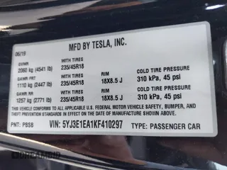 2019 Tesla Model 3 Mid Range with VIN 5YJ3E1EA1KF410297, listed as a IAAI auction lot 41841991 with 176,254 mi miles. Bid and sale history available at carsss.com. Image 9.