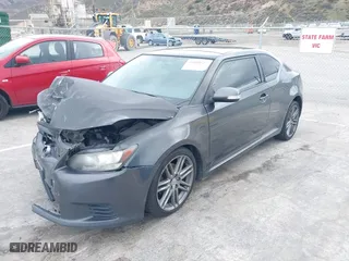 2013 Scion tC with VIN JTKJF5C74D3052964, listed as a IAAI auction lot 41804627 with 244,013 mi miles. Bid and sale history available at carsss.com. Image 2.