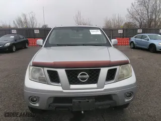 2011 Nissan Frontier PRO-4X with VIN 1N6AD0EV2BC438370, listed as a IAAI auction lot 41952484 with 217,529 mi miles. Bid and sale history available at carsss.com. Image 12.