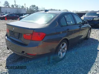2014 BMW 3 Series 328i with VIN WBA3A5G57ENP28138, listed as a IAAI auction lot 41760371 with 147,897 mi miles and . Bid and sale history available at DreamBid. Image 4.