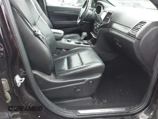 2019 Jeep Grand Cherokee Limited with VIN 1C4RJFBG1KC772977, listed as a IAAI auction lot 42242969 with 96,902 mi miles and . Bid and sale history available at DreamBid. Image 5.