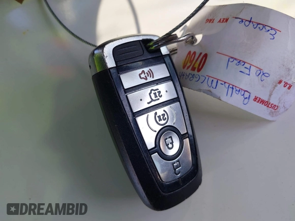 2020 Ford Escape Titanium z VIN 1FMCU9J98LUA44923, wystawiony jako IAAI lot #41779691 z przebiegiem 73 259 mil mil oraz . Historia ofert i sprzedaży dostępna na DreamBid. Obrazek 11.
