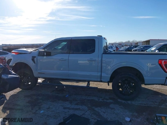 2023 Ford F-150 XL with VIN 1FTFW1ED1PFB51382, listed as a IAAI auction lot 41473514 with 23,295 mi miles. Bid and sale history available at carsss.com. Image 14.