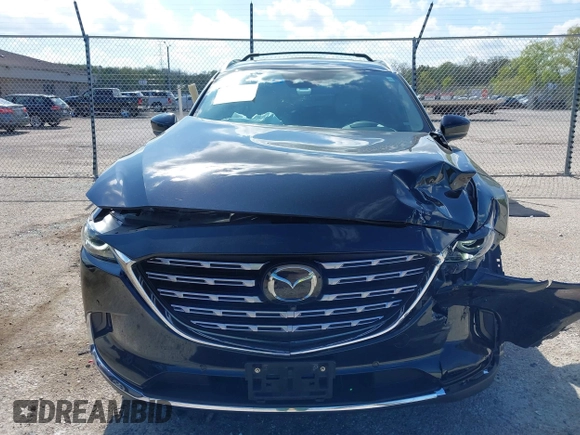 2021 Mazda CX-9 Signature with VIN JM3TCBEY1M0539786, listed as a IAAI auction lot 42264611 with 51,168 mi miles and . Bid and sale history available at DreamBid. Image 12.