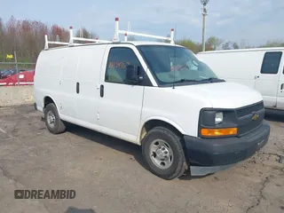 2017 Chevrolet Express Cargo Van with VIN 1GCWGAFF7H1120858, listed as a IAAI auction lot 42124363 with 163,848 mi miles. Bid and sale history available at carsss.com. Image 1.