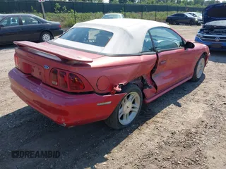 1996 Ford Mustang GT with VIN 1FALP45X1TF202228, listed as a IAAI auction lot 42618417 with 112,789 mi miles and . Bid and sale history available at DreamBid. Image 4.