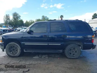 2005 Chevrolet Tahoe LT with VIN 1GNEC13T15R213638, listed as a IAAI auction lot 41787524 with 153,709 mi miles and . Bid and sale history available at DreamBid. Image 14.