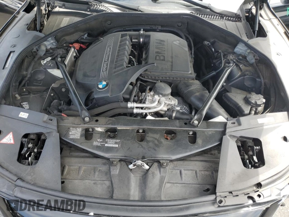 2013 BMW 7 Series 740i with VIN WBAYA6C58DC994974, listed as a Copart auction lot 55534645 with 106,975 mi miles and Salvage title. Bid and sale history available at DreamBid. Image 11.