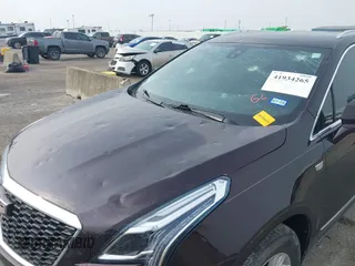 2021 Cadillac XT5 FWD Luxury with VIN 1GYKNAR44MZ184070, listed as a IAAI auction lot 41934265 with 60,596 mi miles and . Bid and sale history available at DreamBid. Image 6.