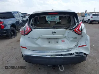 2015 Nissan Murano SL z VIN 5N1AZ2MH5FN213233, wystawiony jako IAAI lot #41869124 z przebiegiem 125 104 mil mil oraz . Historia ofert i sprzedaży dostępna na DreamBid. Obrazek 16.