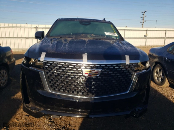 2024 Cadillac Escalade Premium Luxury with VIN 1GYS4BKL9RR232325, listed as a Copart auction lot 77145544 with 4,677 mi miles and Salvage Title. Bid and sale history available at carsss.com. Image 5.