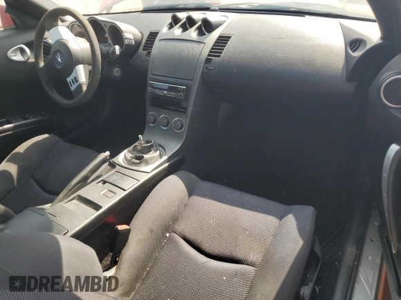 2003 Nissan 350Z Performance z VIN JN1AZ34D63T118262, wystawiony jako Copart lot #59956315 z przebiegiem Nie podano mil oraz Czysty tytuł • Clean title. Historia ofert i sprzedaży dostępna na DreamBid. Obrazek 8.