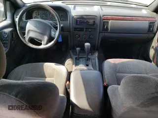 2000 Jeep Grand Cherokee Laredo with VIN 1J4GW48S6YC404063, listed as a Copart auction lot 59442725 with 268,543 mi miles and Salvage title. Bid and sale history available at DreamBid. Image 8.