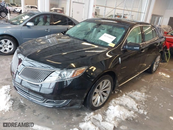 2015 Lincoln MKS with VIN 1LNHL9DK9FG604085, listed as a IAAI auction lot 41251811 with 58502 miles. Bid and sale history available at carsss.com. Image 2.