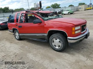 1999 GMC Yukon with VIN 1GKEK13R5XJ768856, listed as a Copart auction lot 67579134 with 189,397 mi miles and Salvage Title. Bid and sale history available at carsss.com. Image 4.