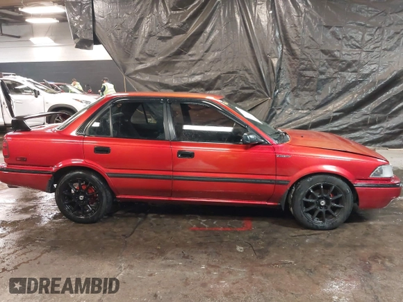 1991 Toyota Corolla with VIN 2T1AE94A4MC063109, listed as a IAAI auction lot 41357536 with 81,958 mi miles and . Bid and sale history available at DreamBid. Image 13.