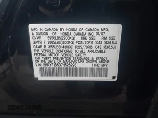 2007 Honda Pilot EX-L with VIN 2HKYF18507H526293, listed as a IAAI auction lot 41111983 with 101,170 mi miles. Bid and sale history available at carsss.com. Image 9.