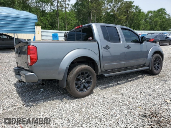 2021 Nissan Frontier SV z VIN 1N6ED0EAXMN721900, wystawiony jako Copart lot #57344215 z przebiegiem Nie podano mil oraz Szkoda całkowita • Salvage title. Historia ofert i sprzedaży dostępna na DreamBid. Obrazek 3.